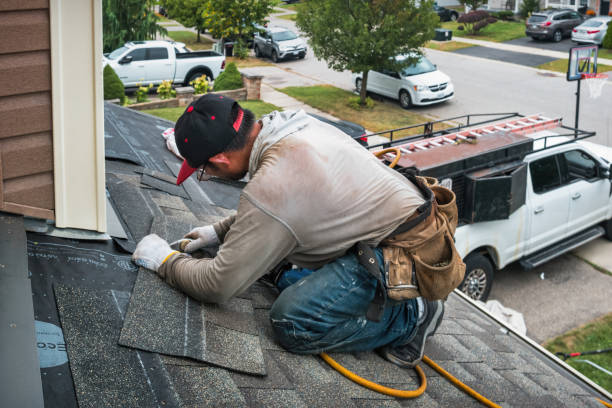 Professional Gutter Installation technician working in Southborough, MA